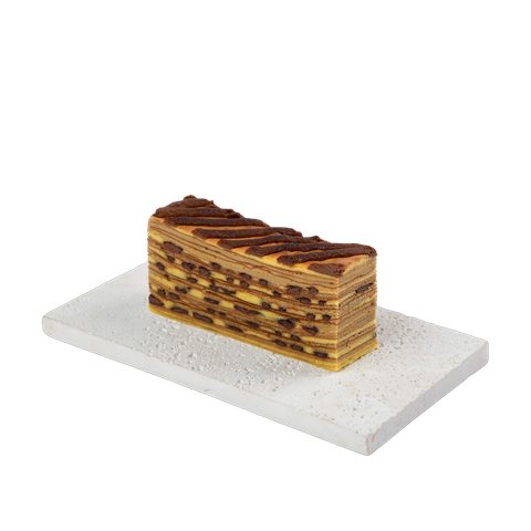 Kek Lapis Hazelnut, cut to show the layers